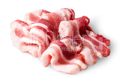 Several pieces of bacon arranged by waves