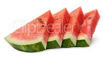 Several slices of watermelon stacked ladder