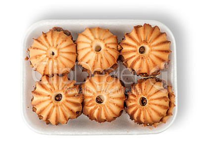 Shortbread biscuits with filling in plastic tray top view