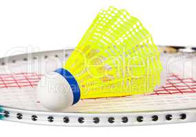 Shuttlecock lying on the badminton racket