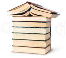 Stack of six old books with two open top rotated