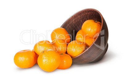 Tangerines Spill Out Of Clay Bowl