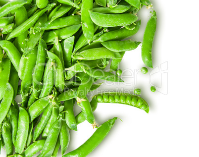 The scattered pods of green peas