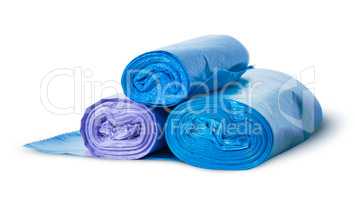 Three rolls of plastic garbage bags rotated