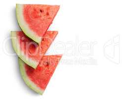 Three slices of watermelon on each other