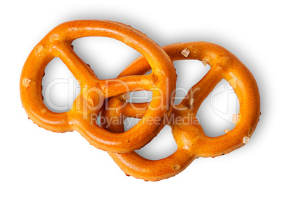 Two crunchy pretzels with salt on each other