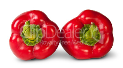 Two Red Bell Peppers Lying Beside