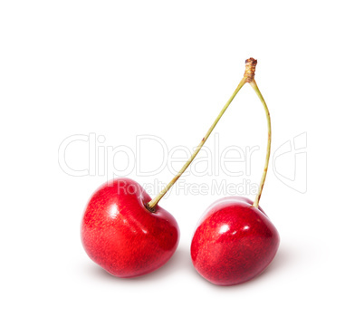 Two red juicy sweet cherries deployed