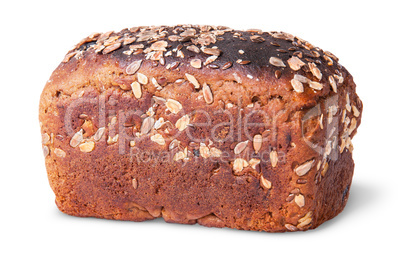 Unleavened black bread with nuts seeds and dried fruit rotated