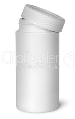 White plastic bottle for vitamins with lid removed