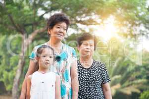 Grandmother and granddaughter outdoor.