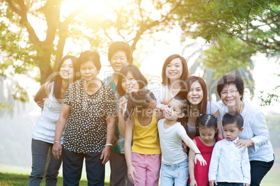 Large group of Asian multi generations family outdoors