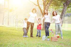 Group of Asian family outdoors