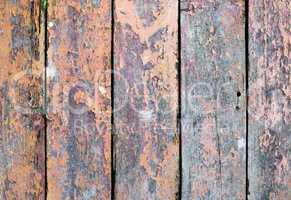 Wooden boards with peeling paint