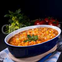 fish with vegetables in tomato sauce