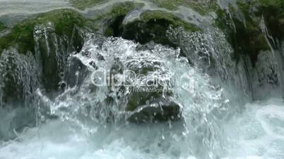 Waterfall on a Mountain River Close-up. Slow Motion