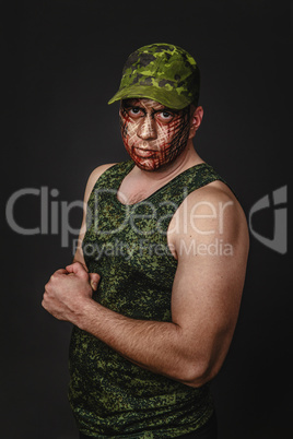 Military Style Camouflage on the Soldier's Face