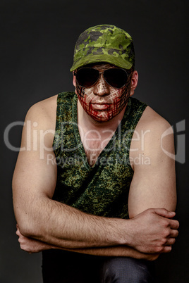 Military Style Camouflage on the Soldier's Face