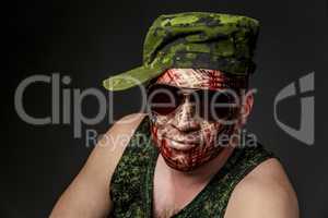 Military Style Camouflage on the Soldier's Face