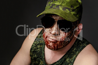 Military Style Camouflage on the Soldier's Face