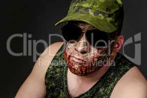 Military Style Camouflage on the Soldier's Face