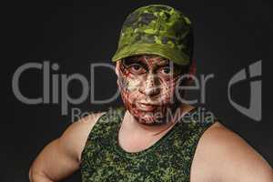 Military Style Camouflage on the Soldier's Face