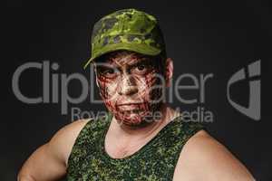 Military Style Camouflage on the Soldier's Face