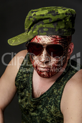 Military Style Camouflage on the Soldier's Face