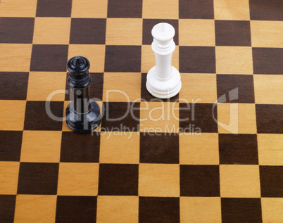 wooden checkerboard with figures