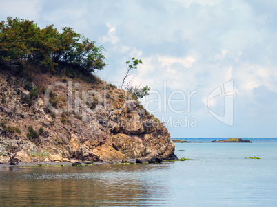 Rocky cliff and sea