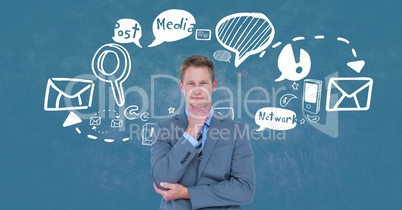 Thought businessman standing by various icons against blue background