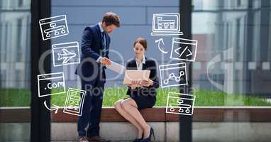 Digital composite image of business people using technologies by icons