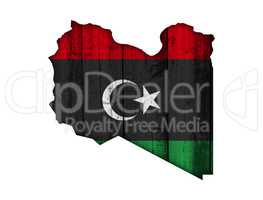 Karte und Fahne von Libyen auf verwittertem Holz