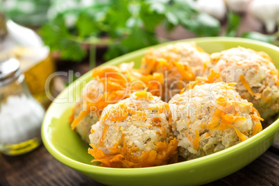 Chicken meatballs with rice braised in vegetables