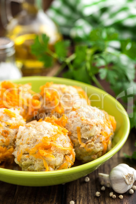 Chicken meatballs with rice braised in vegetables