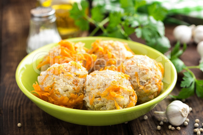 Chicken meatballs with rice braised in vegetables