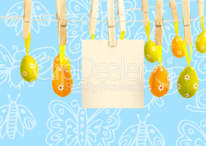 Easter Eggs with note on pegs in front of pattern