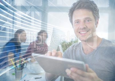 Man with tablet behind arrow graphic overlay