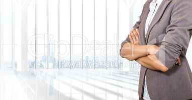 Business woman with blazer and her hands folded in the office