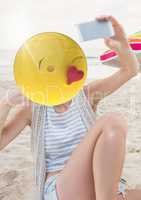 Selfie in the beach . Emoji face