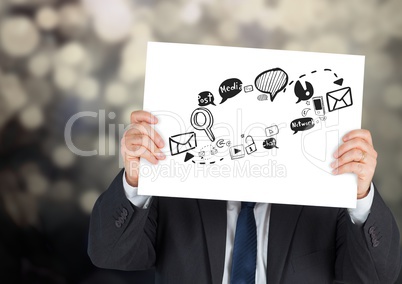 Businessman holding card with social media graphic drawings