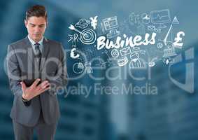 Businessman on tablet with Business text with drawings graphics