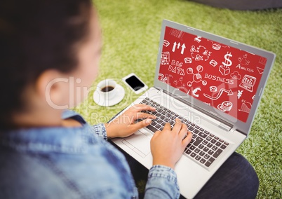 Woman on grass with laptop showing white business doodles and red background
