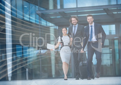 Three business people with luggage and arrow graphic overlay