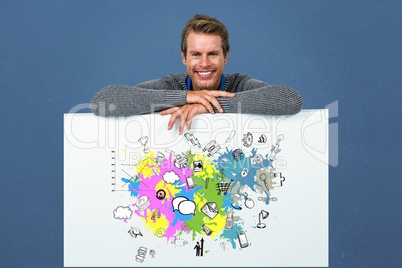 Happy man leaning on placard with social media icons