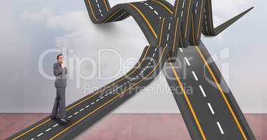 Digitally generated image of  businessman on wavy road in sky