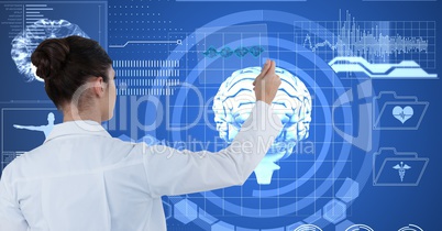 Digitally generated image of female doctor touching futuristic screen