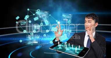 Businessman with tablet PC touching virtual screen