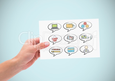 Hand holding card and chat bubbles of business graphics drawings