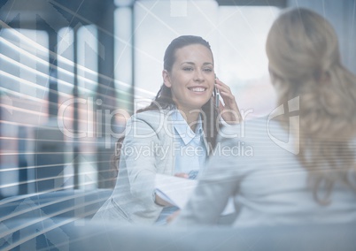 Business woman on phone behind arrow graphic overlay